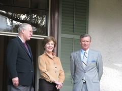 Mr. Moe, Mrs. Bush, and Dr. Milligan on the veranda at President Lincoln