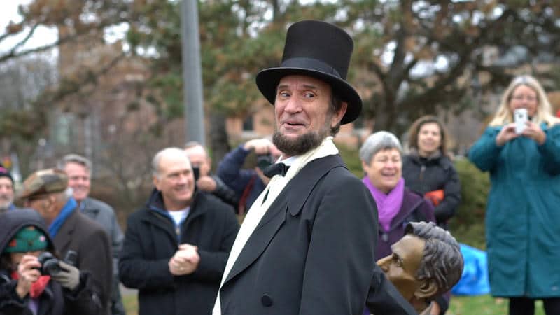 Lincoln presenter Michael Krebs at the unveiling of the Laughing Lincoln statue in Naperville